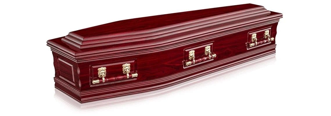 Elegant polished wooden coffin with gold handles.